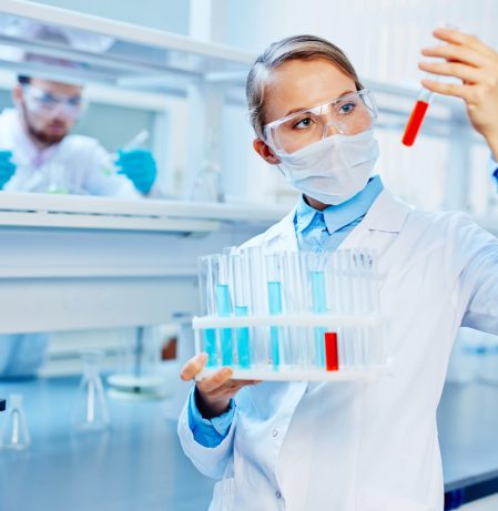 Science and research Young woman examining analysis at laboratory